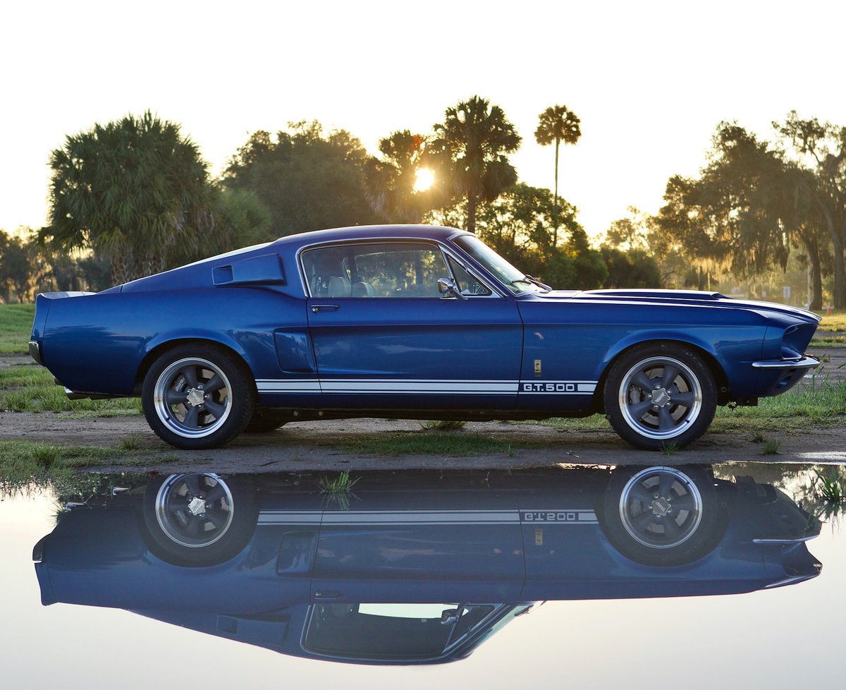 RevologyCars's tweet photo. A #classic never gets old. The #Revology #1967ShelbyGT500. #710hp 5.0L Ford / Roush #supercharged engine, 6-speed manual transmission. #AcapulcoBlue Metallic with Wimbledon White LeMans stripes. https://t.co/2jnrFKw7Ee