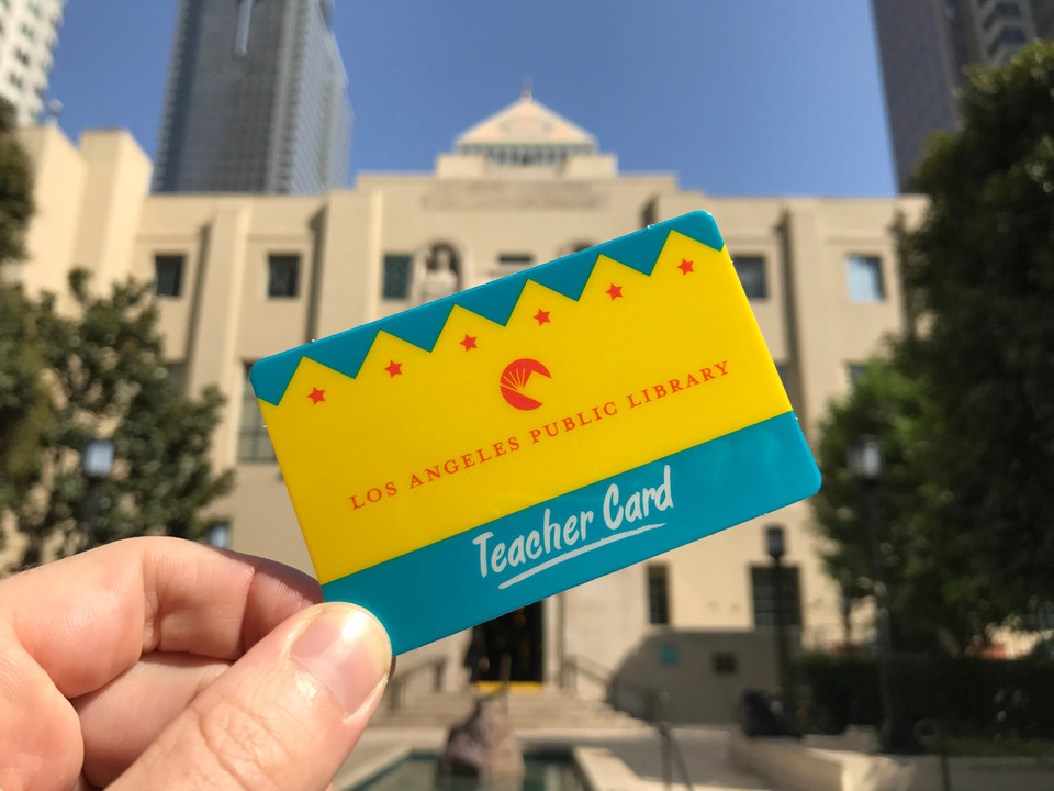 Teacher card in front of Central Library