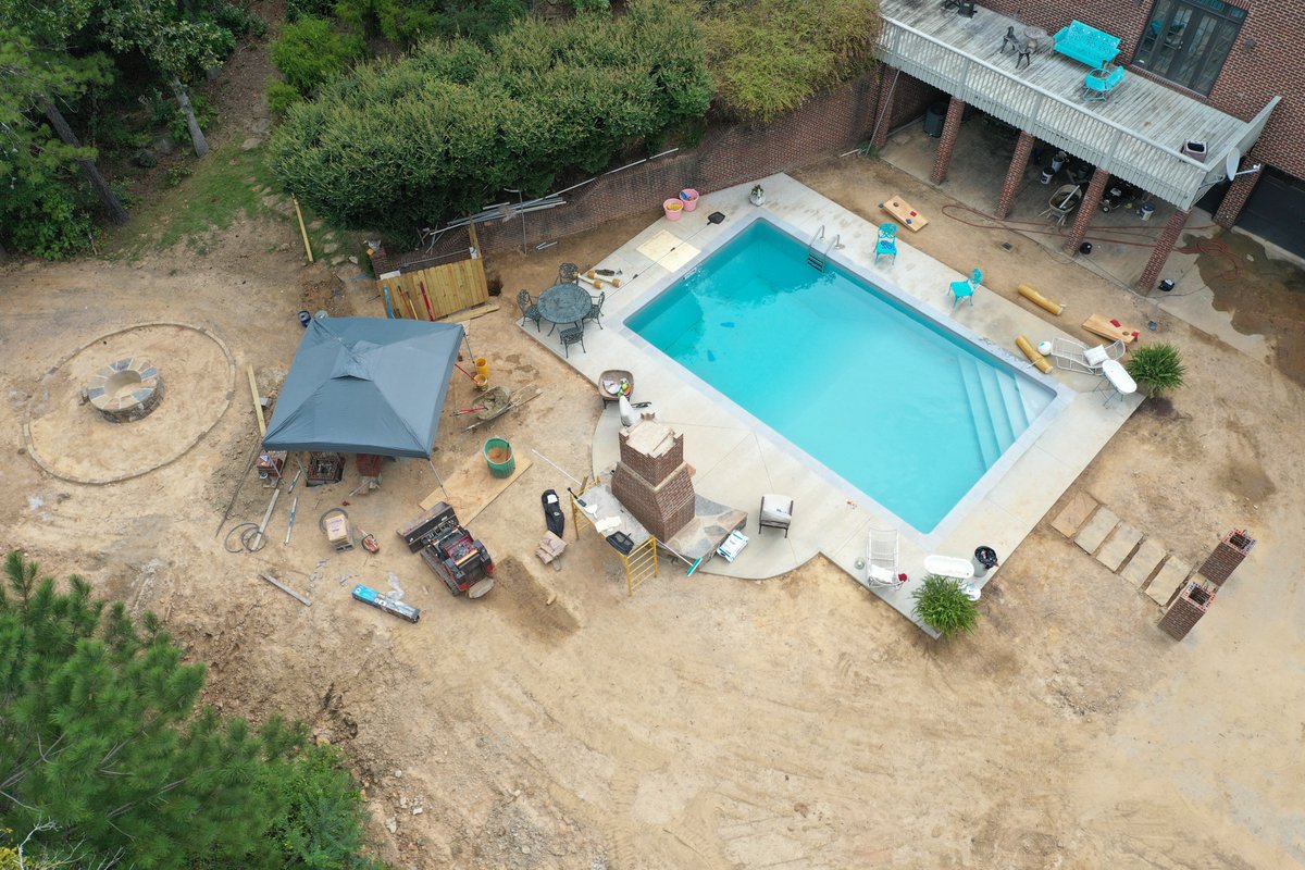 DsldLandMgmt's tweet photo. We now have water in the pool as we approach the finish on this backyard transformation! This customer decided on a Desjoyaux pool, fire pit, and fireplace. We can't wait to put the final touches on this project, and leave another customer satisfied! https://t.co/U2cxRQK8FP