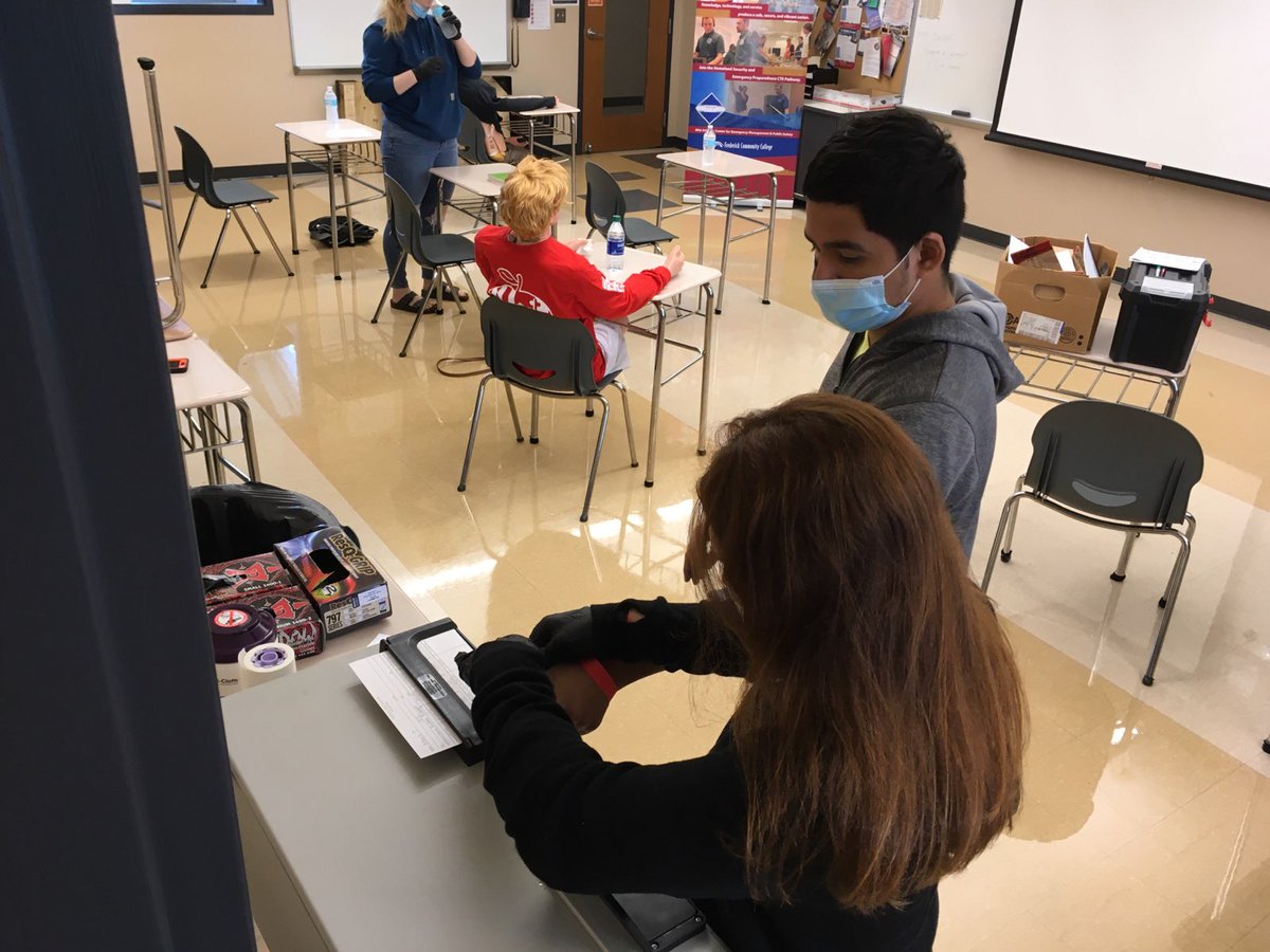 CteDcps's tweet photo. We began a unit on Fingerprints today. Here, Kirsten is fingerprinting Alexis. It's hard to do from a distance, as shown here, but they did a good job. Later, the determined if their prints were Arches, Loops, or Whorls. Do you know what you have? https://t.co/v5mgCxNop9