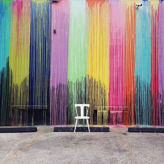 Brighten up your #TravelTuesday with a quick stop at Houston's iconic Biscuit paint wall! #artists #houstontx #texastodo #texaslife #texasgram #Traveltheworld #dailydoseofcolor #streetart