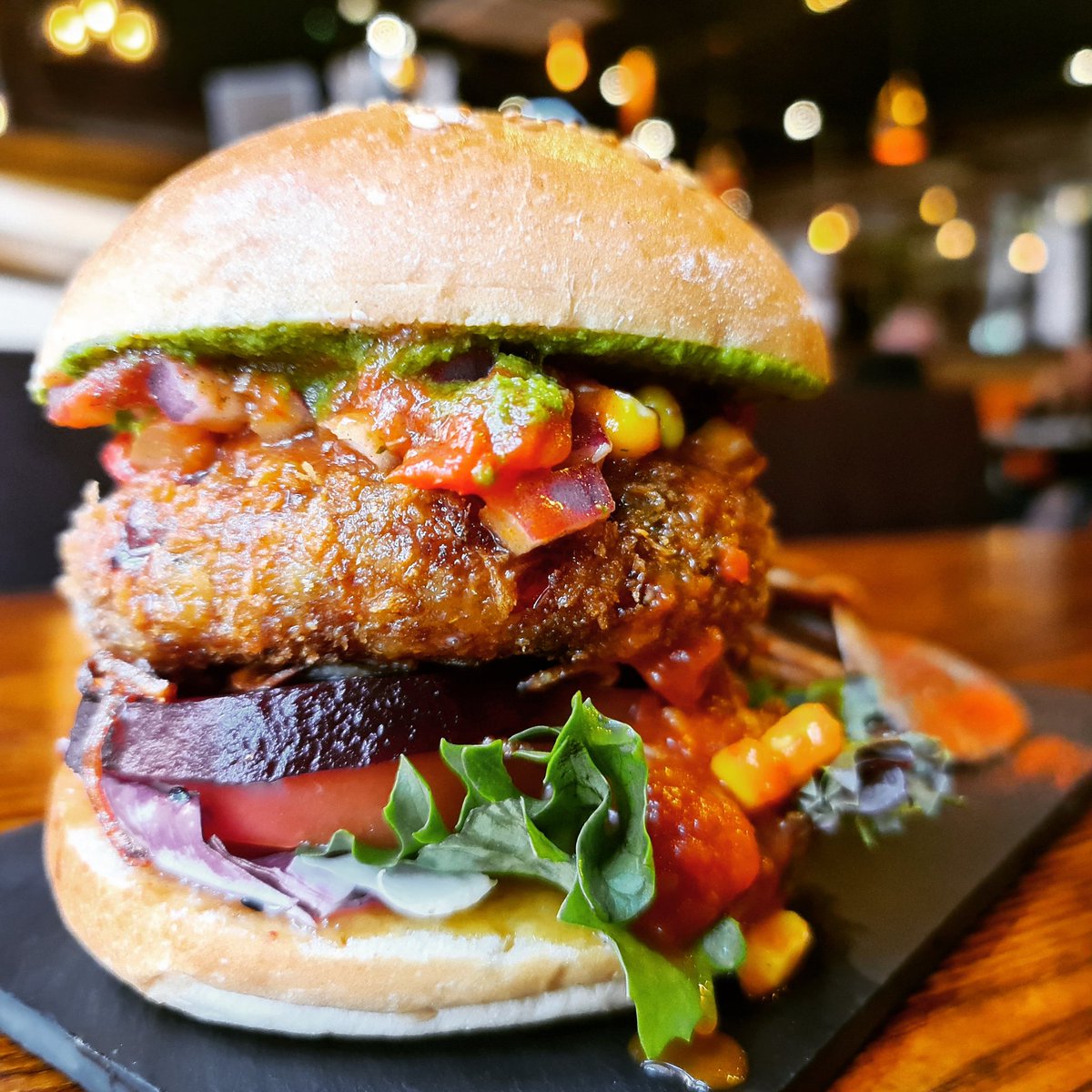 Swadishuk's tweet image. 🚨Bombay burger for your Lunchtime?

Our own homemade bun, vegetables patties, beetroot,  onion and sweetcorn salsa, coriander chutney.

📢Taste something quick and new for your lunch at Swadish 🎊🥳🎊

#swadishlunchmenu #naanwich #indianburger