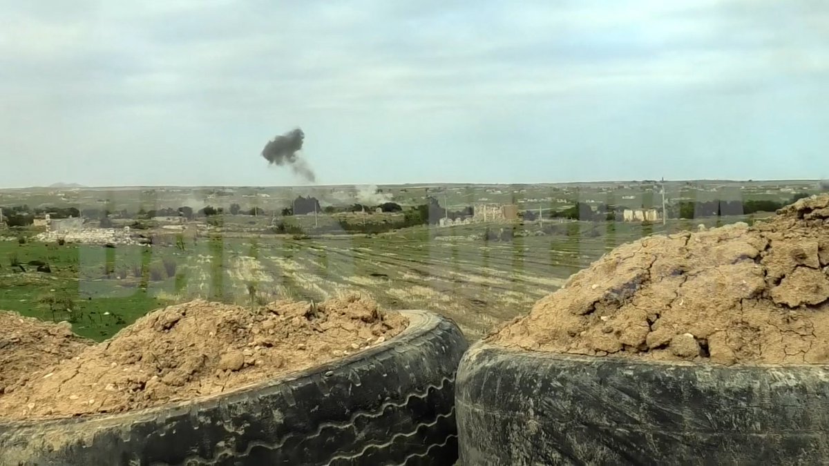 Screenshots showing a destroyed Armenian tank and Azerbaijani soldiers from Nagorno-Karabakh forces' fighting positions. 317/