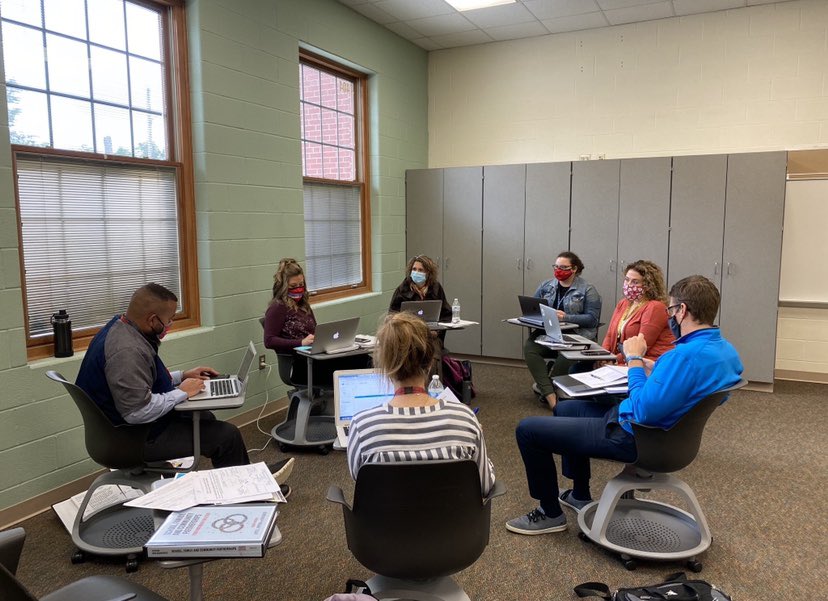 ChrisGibowicz's tweet photo. AMS’s Family Engagement Team collaborating. #RepThatA https://t.co/9nP7qZOZCC