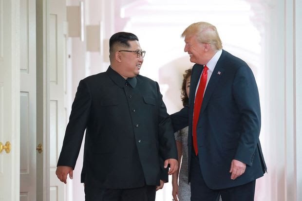 Donald Trump speaks humbly and respectfully, and only when spoken to, in the presence of Supreme Leader Kim Jong-Un, holding his hat in his hand before his better.