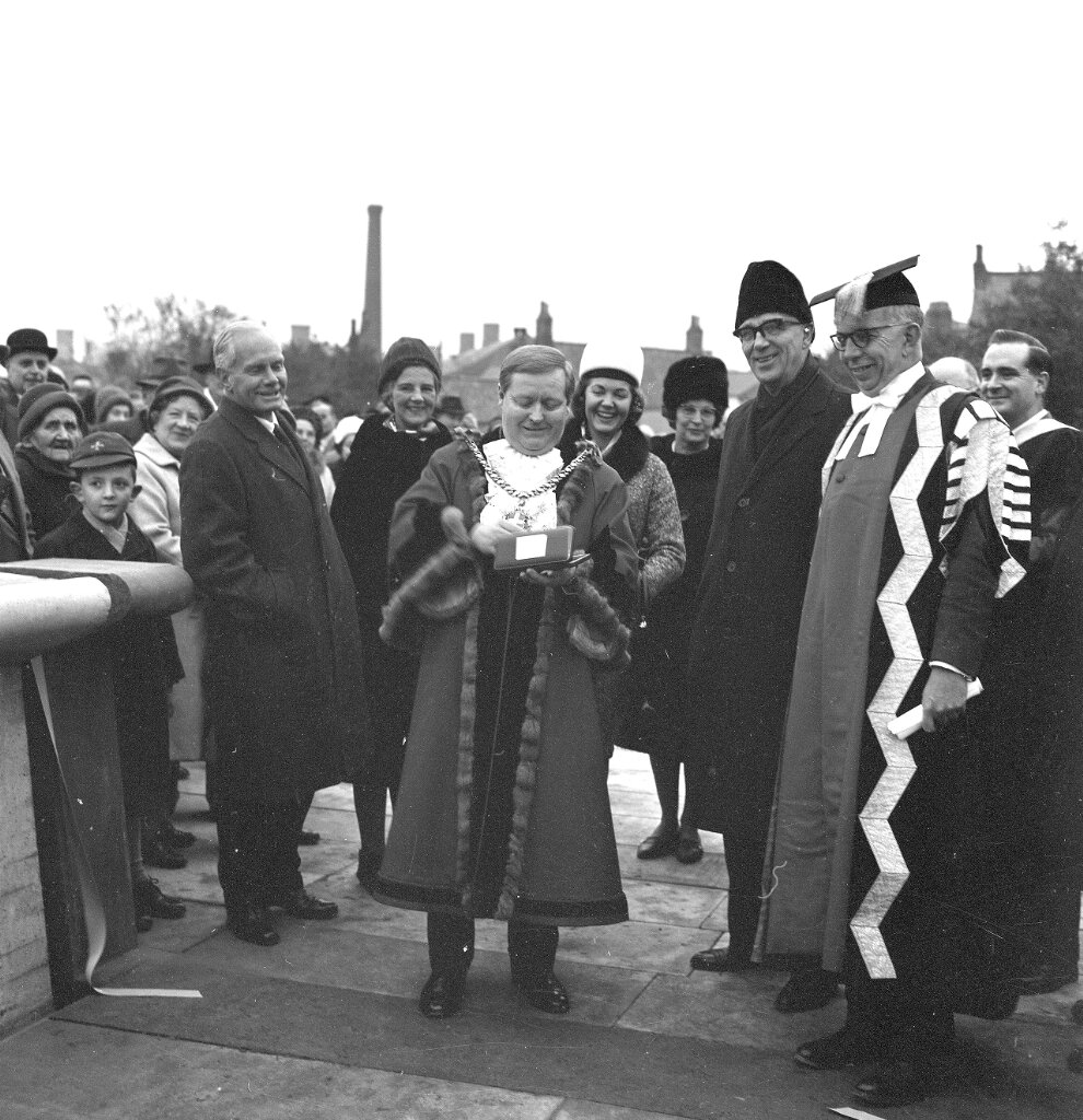 Sir Derman Guy Christopherson Vice Chancellor of Durham University and Ove Arup watch the Mayor of Durham cutting the ribbon at the official opening of the bridge.  #archives  #architecture  #Durham