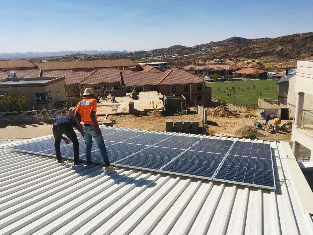 Light_Systems's tweet photo. An LSN #SolarHybridSystem being installed in Windhoek. This system is able to save the client 70% of their electricity bill. https://t.co/yccfCHNIdQ