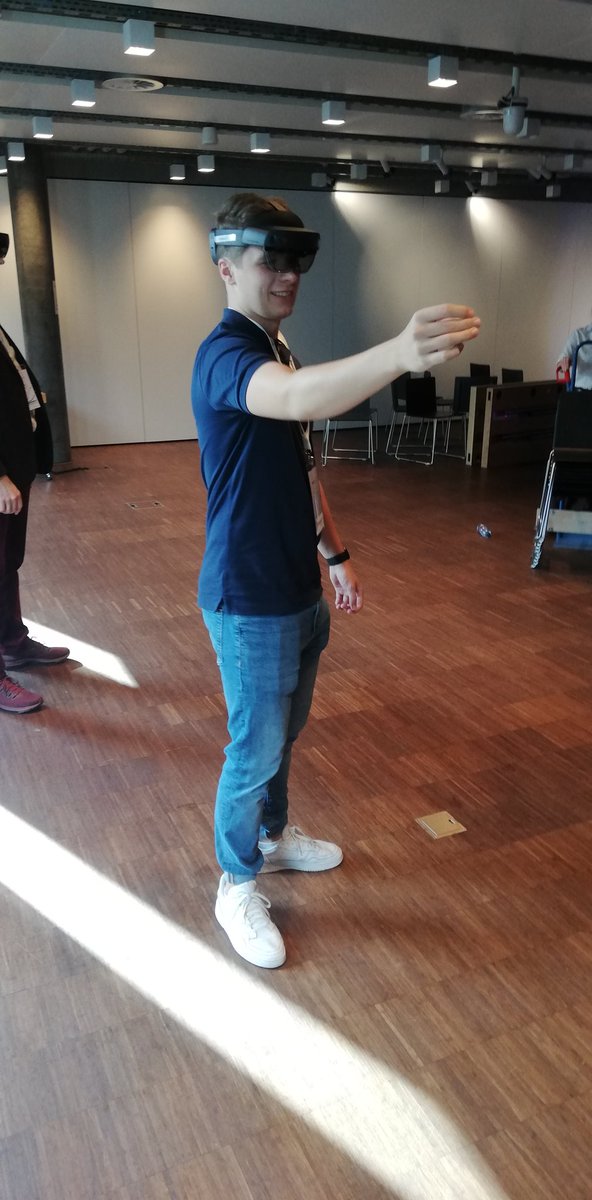 HeikoBrenn's tweet photo. Mika is trying out #Microsoft #HoloLens2 at #ExpertsLiveCH #ScriptRunnerOnTour https://t.co/qymKWNs91x