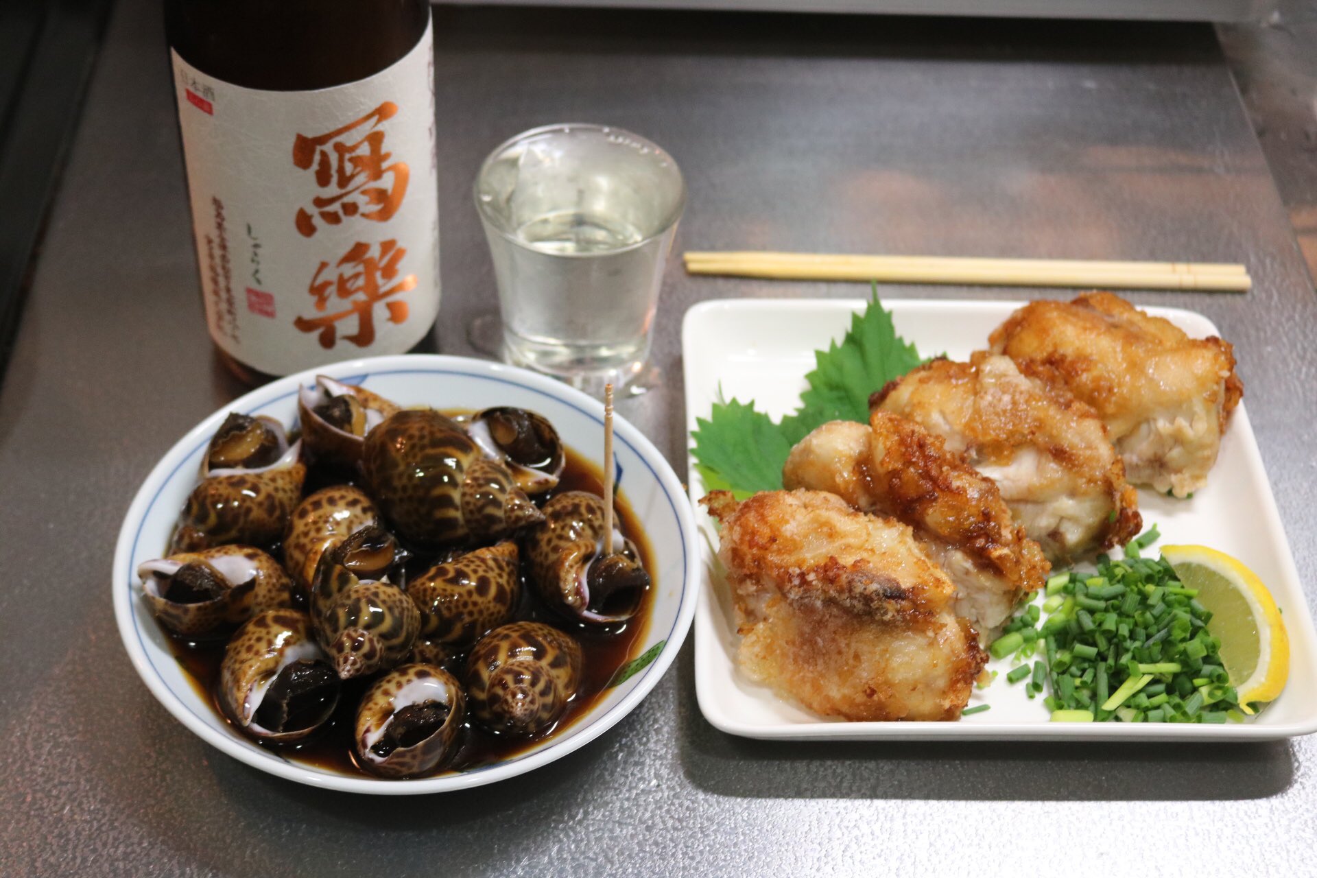 Taipon 晩ごはん バイ貝煮付け かすべのほっぺ唐揚げ 日本酒 乾杯です Taipon 晩ごはん バイ貝煮付け かすべのほっぺ唐揚げ 日本酒 乾杯です