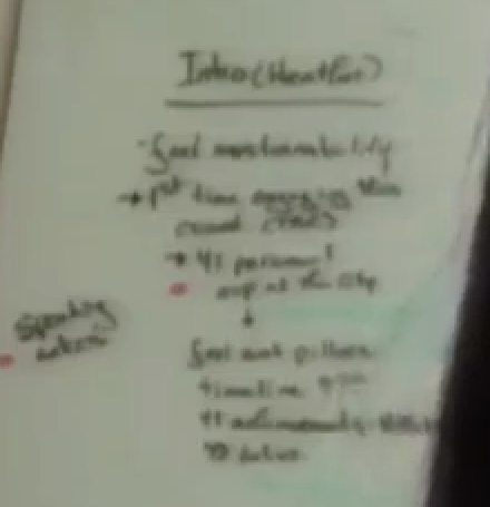 Whenever I see a government-type person talking with a white board in the background: zoom in, zoom in, zoom in. (These appear to be speaking notes.)