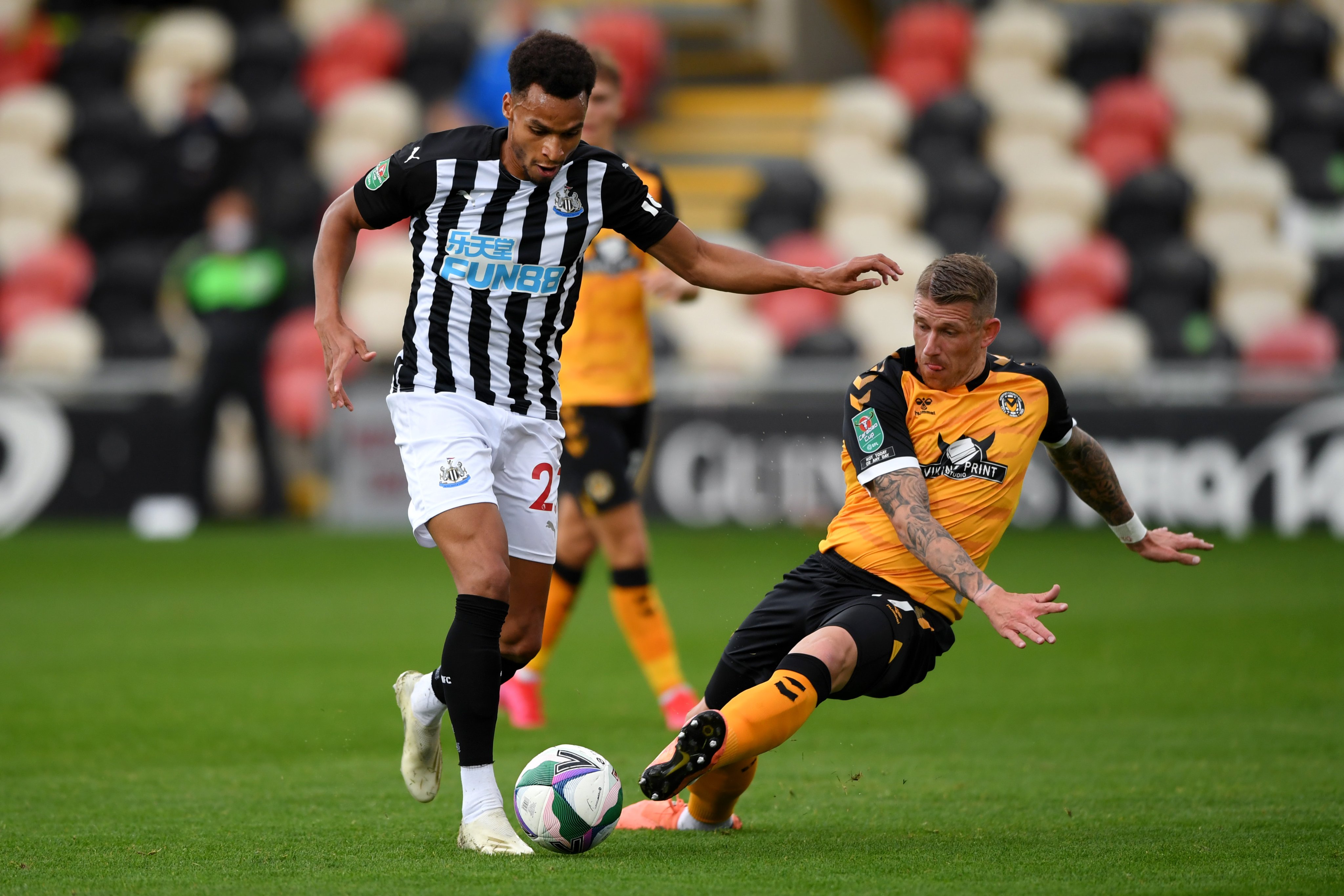 Newcastle star Murphy dribbles with ball