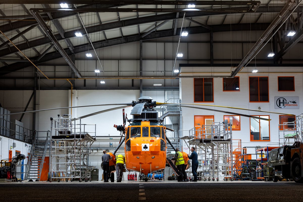 HeliOperations's tweet photo. Like many aircraft with those numbers in the registration, our Sea King Mk 5 with the serial XV666, goes by the traditional nickname ‘Damien’. Here it is being pushed back into our hangar at the HeliOperations heliport facility. #HeliOperations #SARTraining #SAR https://t.co/OesekWKd9X