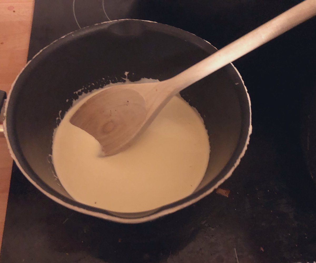heating cream in a small pan until hot and then pouring it over white chocolate to make ganachewhite chocolate ganache often goes a bit yellow but in this case, it's an advantage because it's for making the moon (traditionally an almost orange salted yolk)