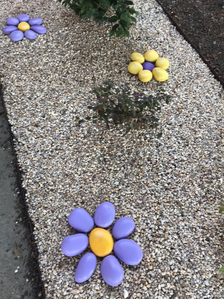 AYCOCKSCHOOL's tweet photo. These three ladies are at it again this Wednesday afternoon! Adding the rocks our students painted last year to our flower beds out front @AYCOCKSCHOOL! Thank you @Lowes for the grant! The students will love seeing this! @scompton2015 @EvaJennings12 @lsoto_liliana #weareaycock https://t.co/DuIIPzSYON