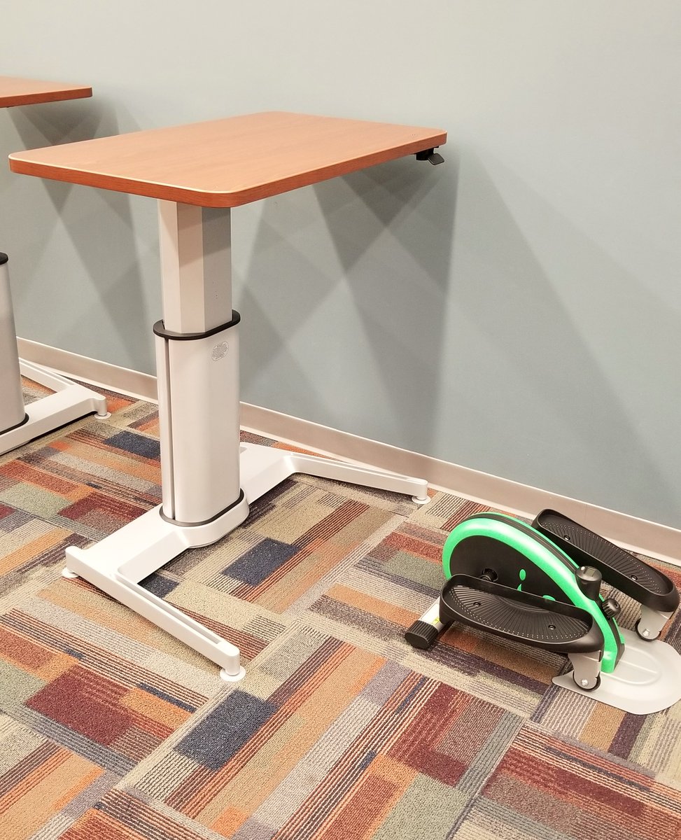 ButlerLib's tweet photo. What is that green thing on the floor? It's a new elliptical station at #IrwinLibrary. We invite you to try it and the height-adjustable desk near the charge bar in the first floor northwest quad. We welcome your feedback at infocommons@butler.edu https://t.co/CGe8K2n3xx