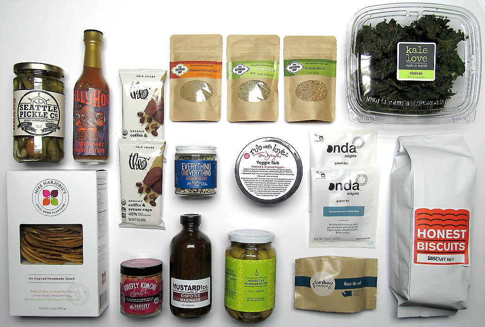 Do206's tweet photo. Prepare for the @_seattlemade Week and get your Taste of #Seattle Made Box filled with locally produced goodies, including spices, rubs, and must-try nibbles, like plantain chips, chocolate, hot sauce, and more. Get more details here: https://t.co/PBuMFb2hJI https://t.co/76Yh21qIyp