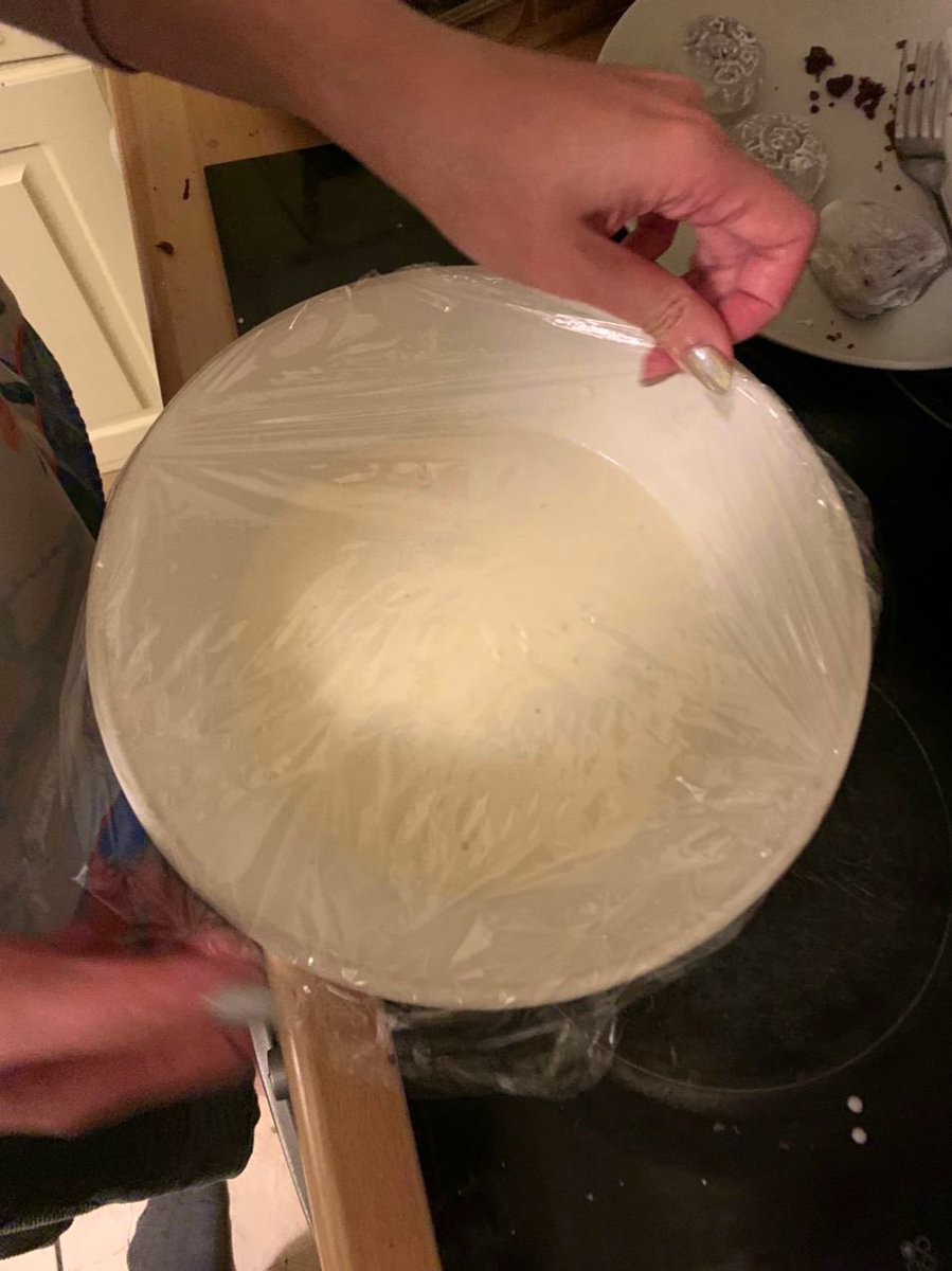 closeups of the snowskin dough as it progresses through the stages of being mixed, microwaved and then kneaded with a spatula until glossythis recipe:  https://www.chinesefoodhistory.org/post/purple-and-white-mooncakes-a-twist-on-an-old-treat-with-a-chocolate-variation