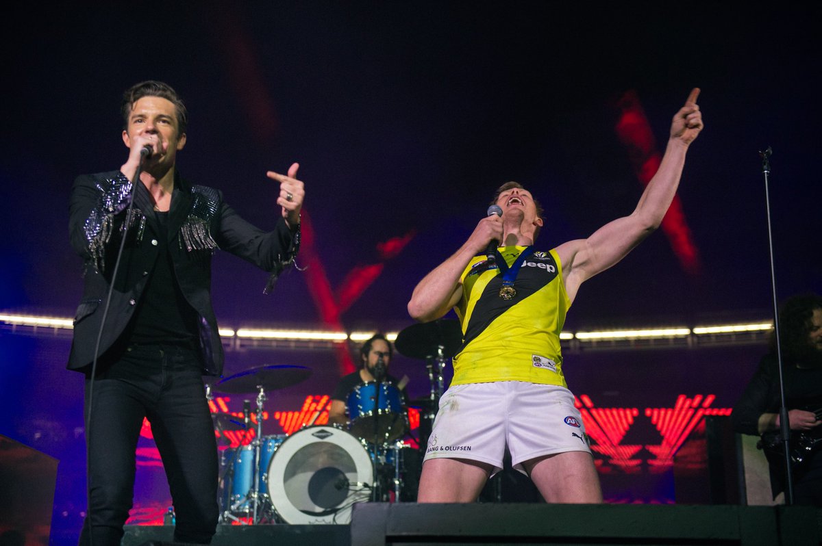 thekillers's tweet photo. We performed at the AFL Grand Final 3 years ago today. 🎂 https://t.co/CZdYlPx6Ap