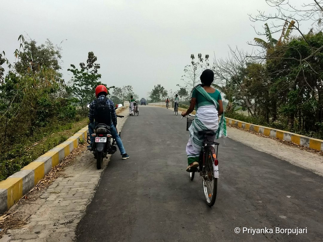 I continue to be amazed by the strength of the women I encounter. This moment was similar: knowing the grit it requires to wear মেখেলা চাদৰ & ride miles to school.Choutara, Assam.Thinking how women only seek justice instead of revenge, in a patriarchal world. On  @outofedenwalk