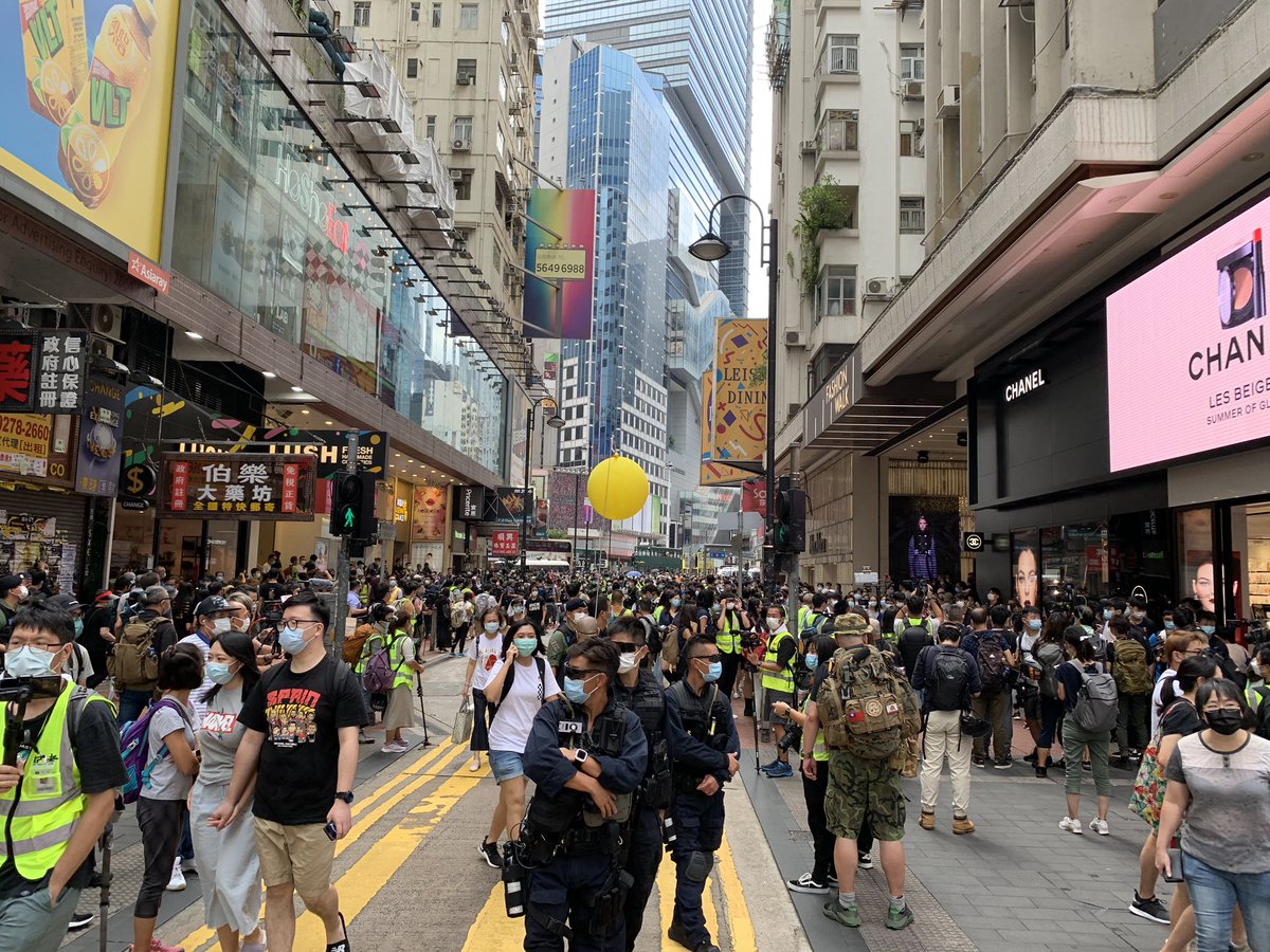 Seditious yellow balloon spotted amongst riot police