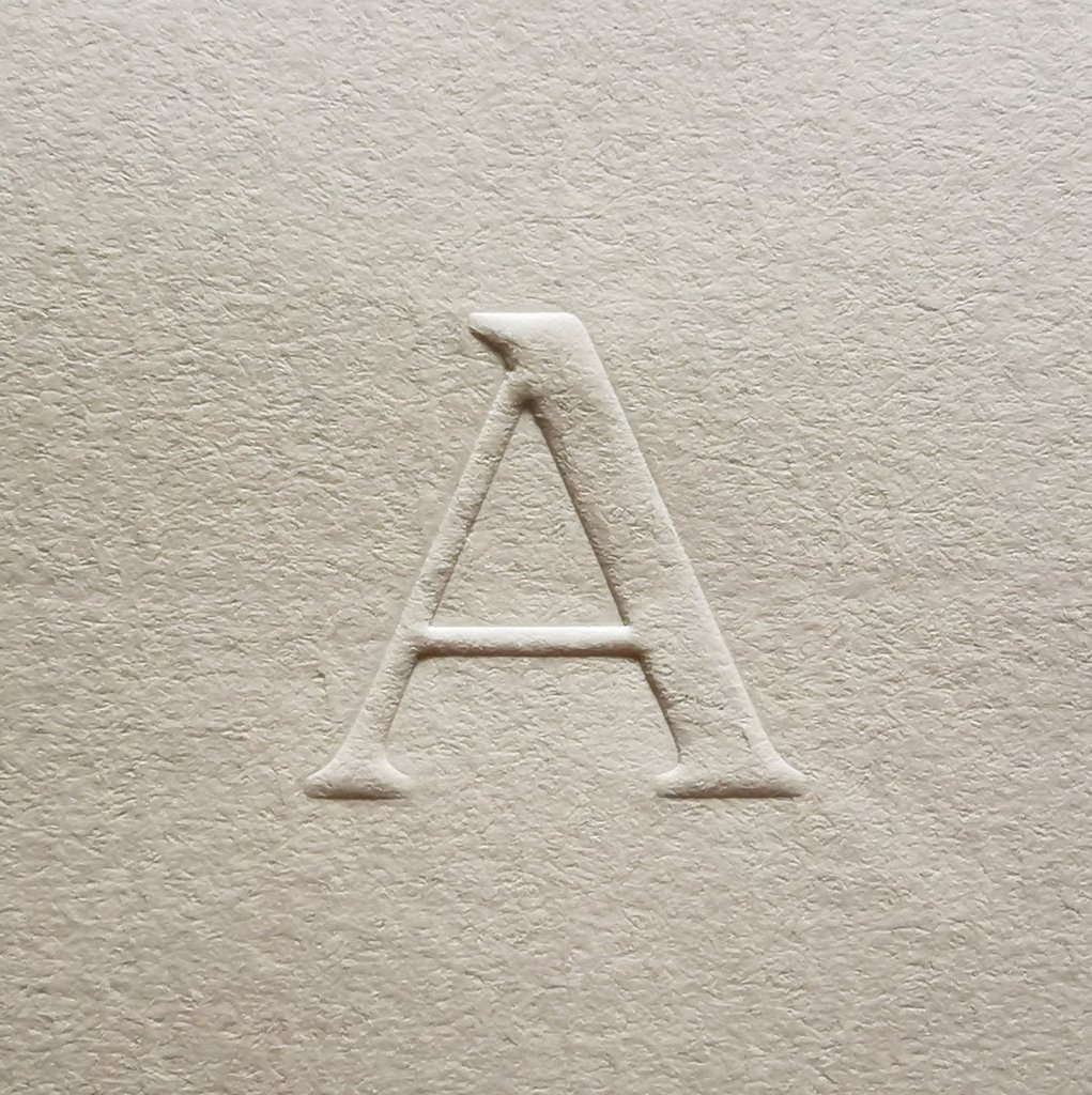 Symbol sticker for #AliumCPH by #Studio8585 Blind embossed on <a href="/AveryDennison/">Avery Dennison</a> Fasson Verge Blanc