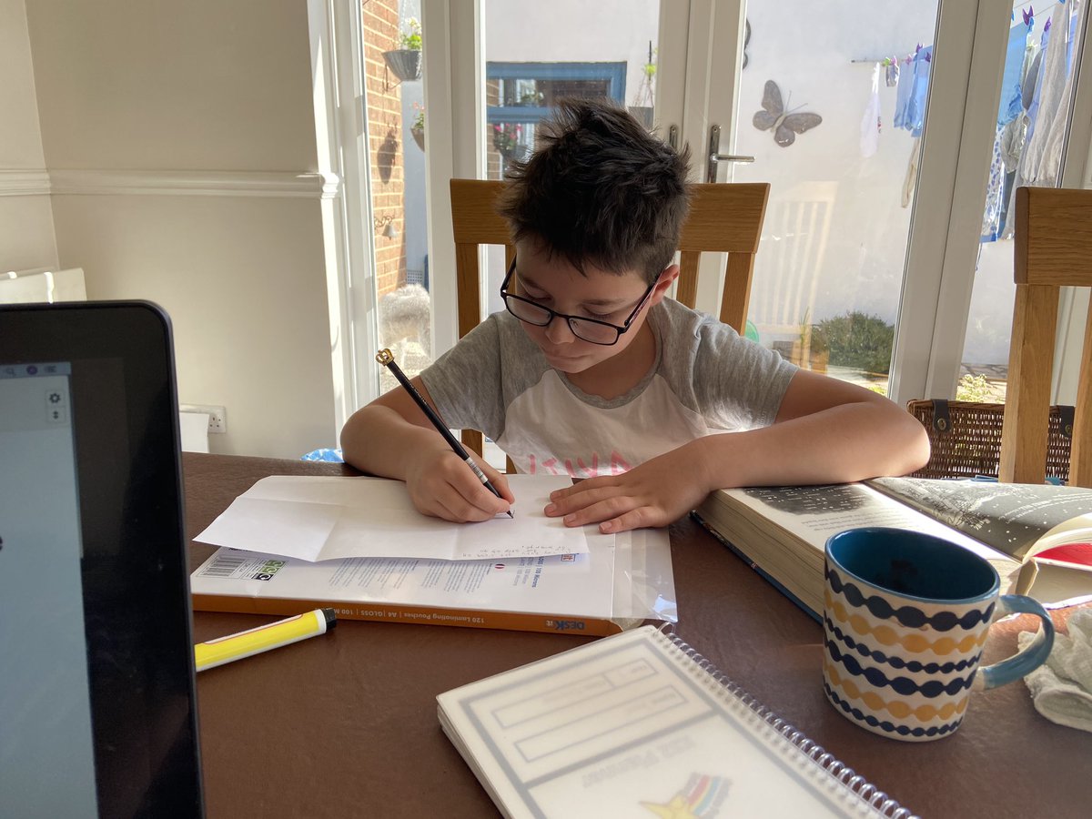 AppleAnna9's tweet photo. Making home learning work. Reading along with his teacher 🥰  Let’s hope he doesn’t become accustomed to a hot chocolate during his English lessons 😂  @CoxhoePrimary https://t.co/n465T2CpVn