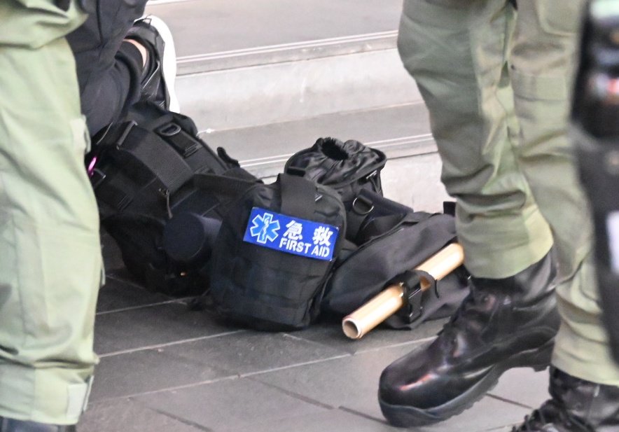 A collection of photos of cops rummaging through medical supplies. If only there was some sort of clear marking on their belongings or on their clothing…