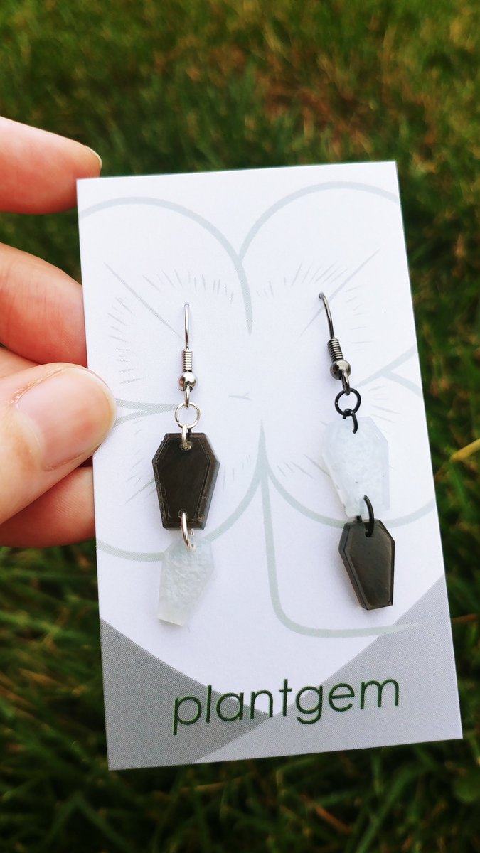 more earrings!!-glow-in-the-dark green planchettes (one of em has a little glitter inside, so i& #39;m ok letting these go for $15)-colorful planchettes: $20-mismatched coffins: $20 (even the findings are mismatched!)-long and gold: $25