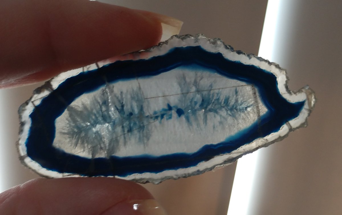 My first rock was a very basic sliver of geode. I was about eight. I promptly broke it. So I tapped it back together. I've moved several times, even out of country and back, but I still have it. And the tape still holds.  #Rocktober  #Crystal  https://twitter.com/FossilLocator/status/1311508862806130688