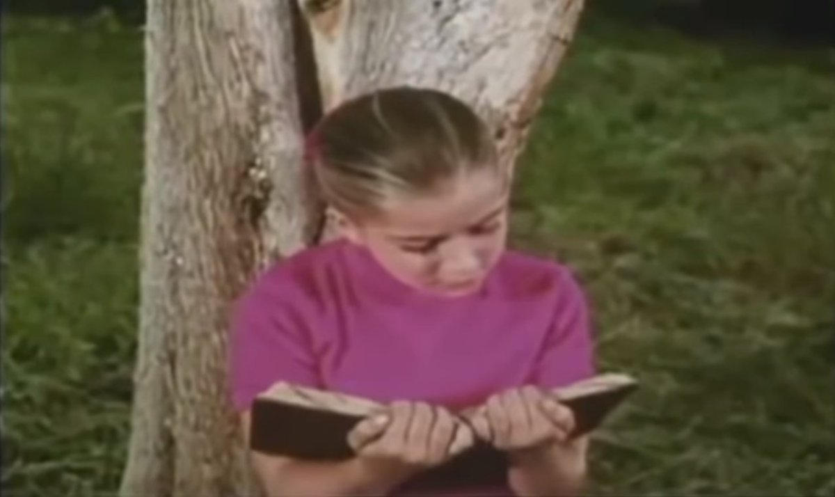 el libro de piedra (1969) ‘the book of stone’ directed by carlos enrique taboada.a little girl befriends a statue of a little boy with a book that is 1000 years old and supposedly talks to her and makes her do things.