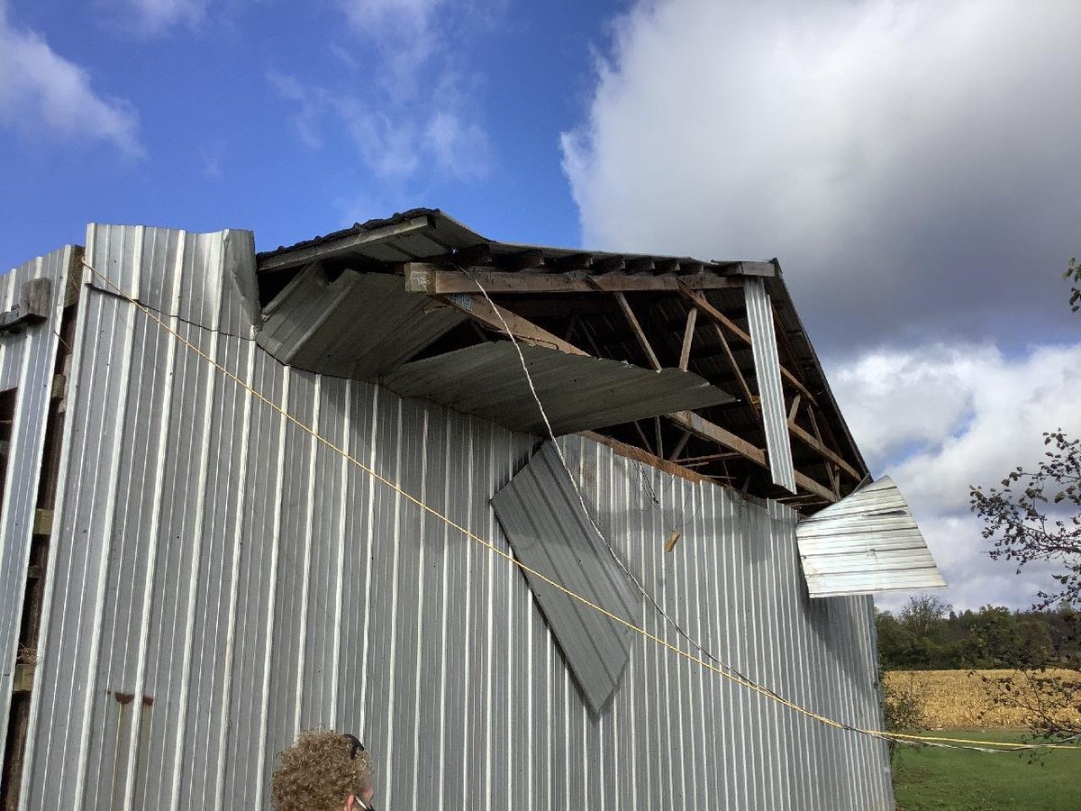 westernuNTP's tweet photo. The @westernuNTP storm survey team confirms that a brief tornado caused a narrow path of damage in the Strabane area of Hamilton, ON at 4:30 PM yesterday. Outbuilding destroyed, barn roof shifted/damaged, trees snapped, truck overturned. Max wind of 150 km/h, rated EF1. #ONstorm https://t.co/7JDEbLsnq2