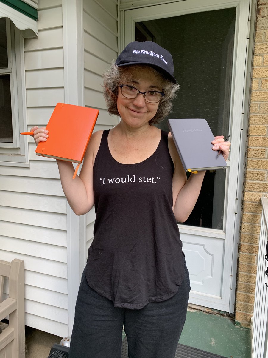 Sporting parting swag and welcome swag, complete with Math Reviews orange and Gray Lady gray notebooks and pens. “I would stet” was my MR catchphrase... but I think that’s gonna change