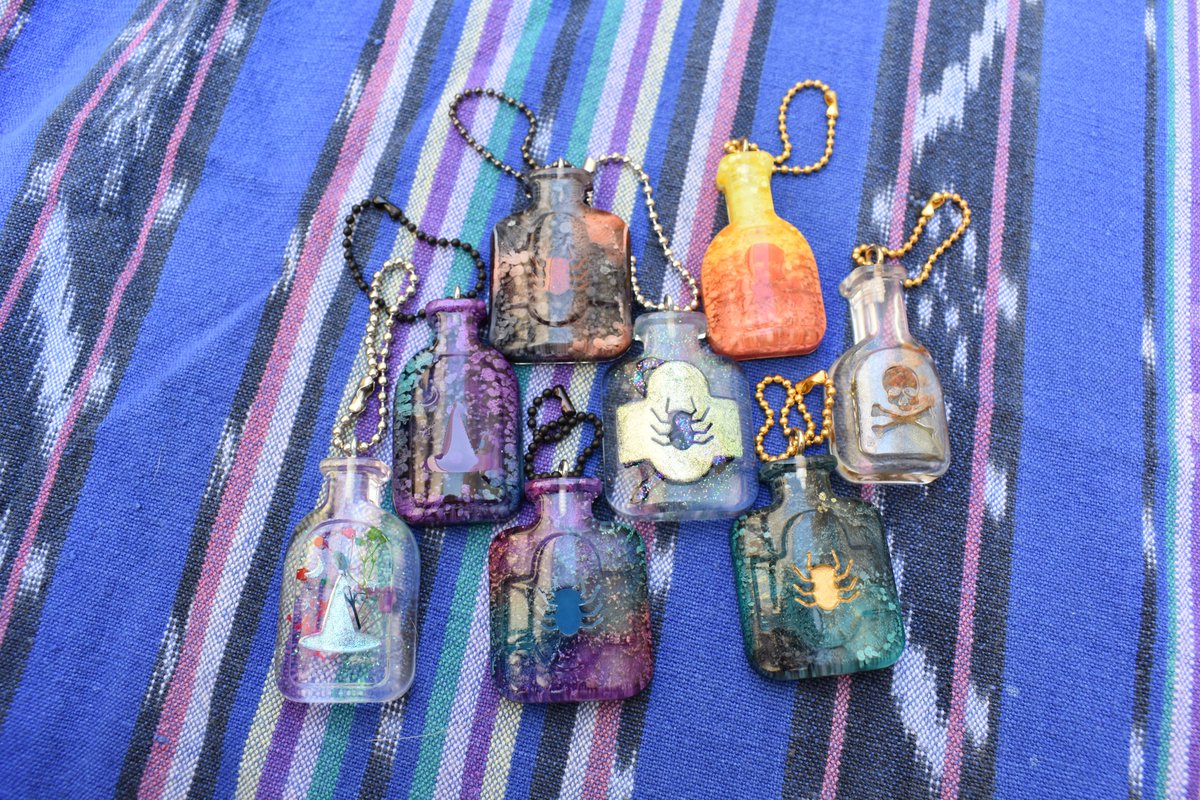spoopy bottle keychains! these are flat on the back.$15ea or two for $25. individual photos are in the thread!