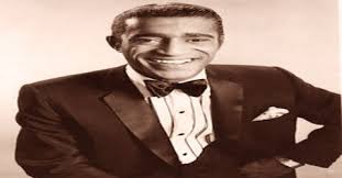 Sixteenth Day. Hispanic Hollywood! Sammy Davis Jr. (1925-1990) was born to an African-American father and an American Latina. His diverse career as a dancer, singer and actor spanned vaudeville, Broadway, film, television, nightclub acts and the recording industry.