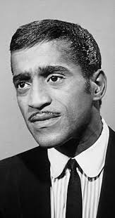 Sixteenth Day. Hispanic Hollywood! Sammy Davis Jr. (1925-1990) was born to an African-American father and an American Latina. His diverse career as a dancer, singer and actor spanned vaudeville, Broadway, film, television, nightclub acts and the recording industry.