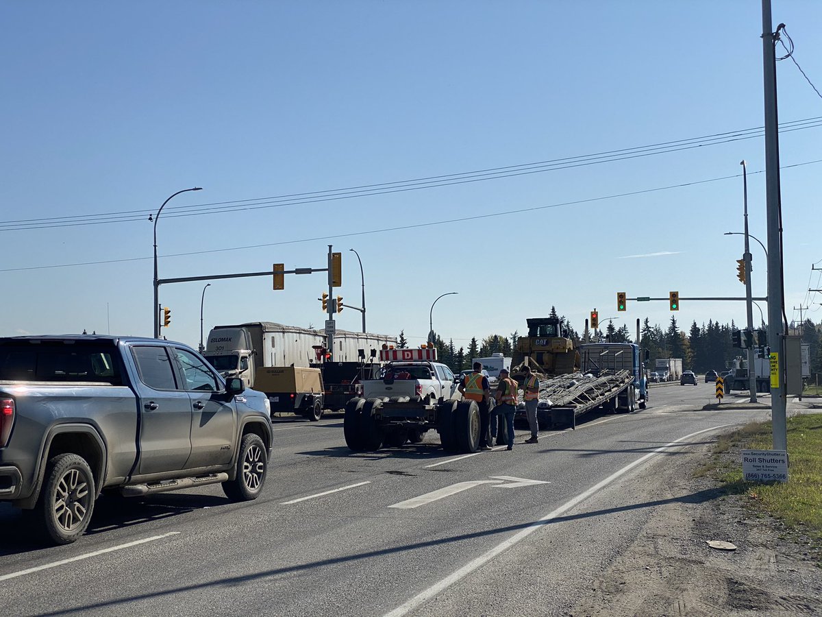 Expect heavy delays at the intersection of Hwy 16 and Ferry Ave in #CityofPG. A trailer hauling rebar has lost its back axles. <a href="/ckpgnews/">CKPG News</a>