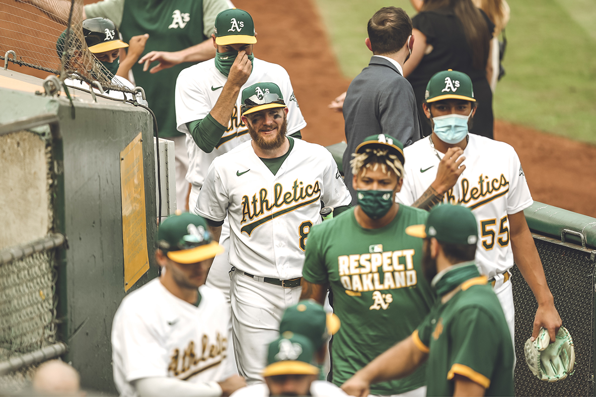 The A's celebrate their 6-4 win over the White Sox