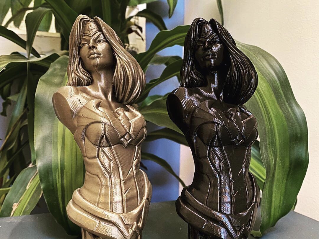 Raise3D's tweet photo. Check out these Wonder Woman models printed in hatchbox bronze and 3D warhorse black PLA on the #raise3de2 in INDEX duplication mode. Thank you @3deltaworkshop for sharing! We are in love! 🔥 

#Raise3D #Raise3Dprinter #3dmodel #3dprinting #3dmodeling #wonderwoman #superhero https://t.co/Vi4r0Fl8kj