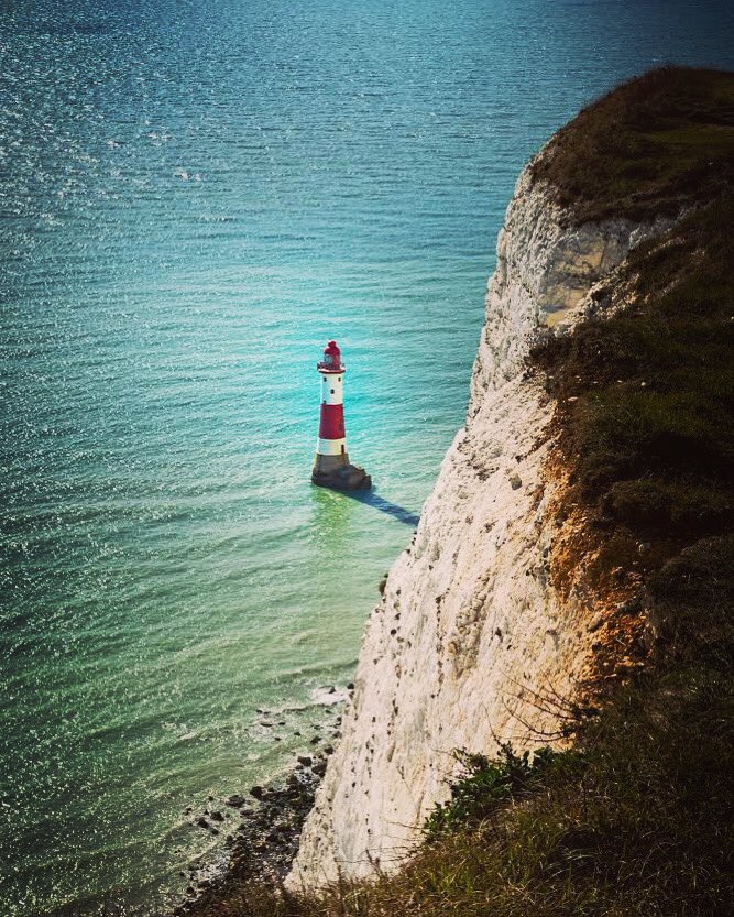 OutdoorReed's tweet photo. Beachy Head is part of Eastbourne’s Downland Estate and has the highest chalk sea cliff in Britain. Along the cliff path there’s a great view of the iconic Beachy Head lighthouse. #beachyhead #cliffwalks #beachyheadlighthouse #cliffside  #lighthouse #beachyheadcliffs #lighthouses https://t.co/qQlOGEIzns