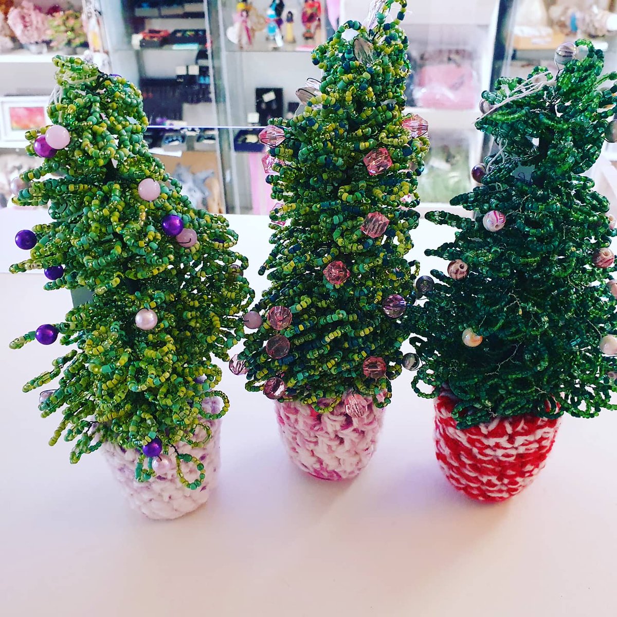 Oh my 🎄 🥰 check out these cute wee Christmas trees 🌲 and I challenge you to look really close... these are make up of hundreds of tiny wee beads 🥰 these have been made by facebook.com/Home-Decor-by-… #homedecorbyaistecarpenter #no26 #handmadewithlove #handmade