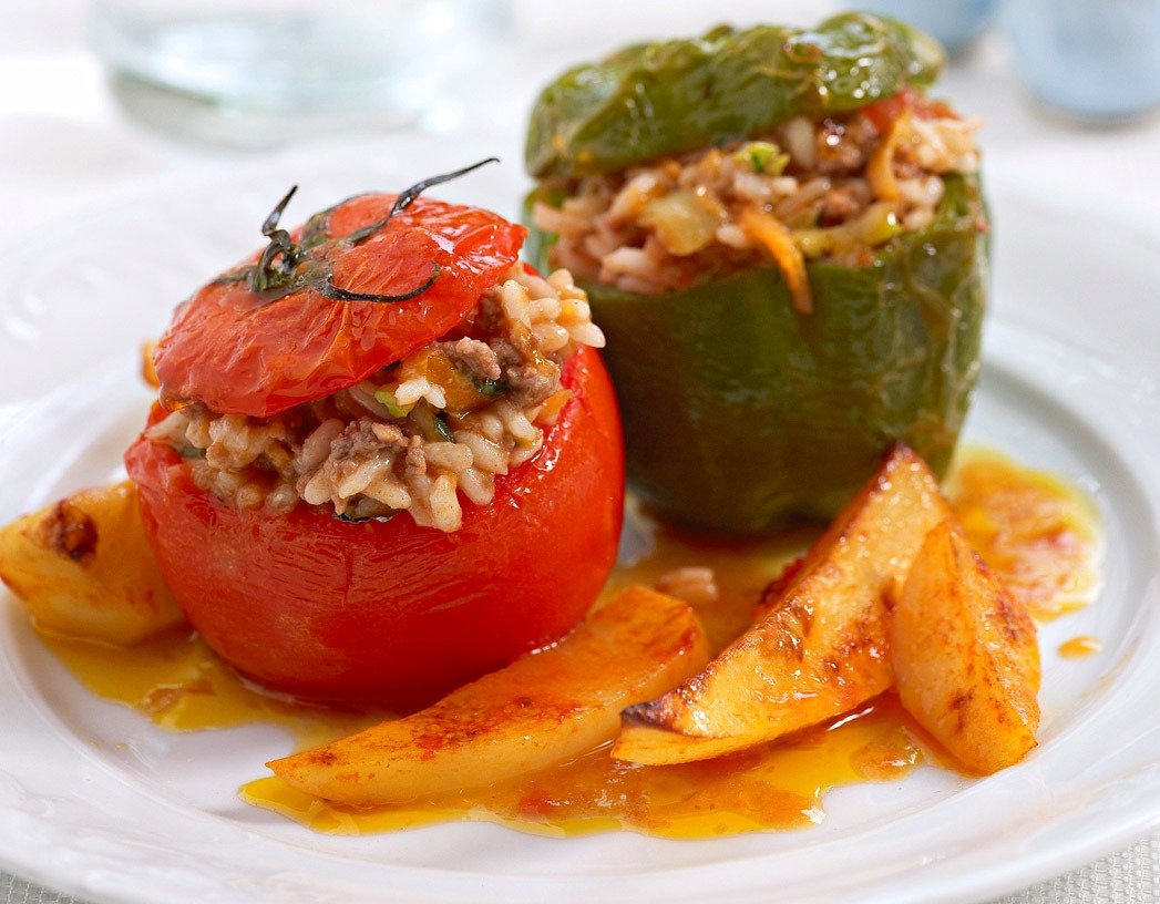 Γεμιστά (stuffed bell peppers\\tomatoes\\zucchini etc with a mixture of rice and minced meat ofter served with potatoes/ Yemista(gemista)