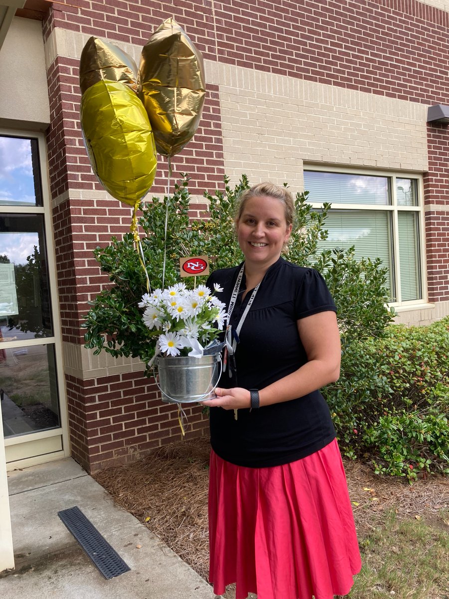 NGMSBulldogs's tweet photo. Congratulations to NGMS's AMAZING Teacher of the Year, Mrs. Elizabeth Cure! Ms. Cure is inspired by her grandmother who taught 5th grade for 50 years. We hope Ms. Cure will inspire Algebra students for 50 years as well! @GwinnettSchools #GCPSTOTY2021 #SHINEBRIGHT #GCPSTOTY https://t.co/RSI33tYvT9