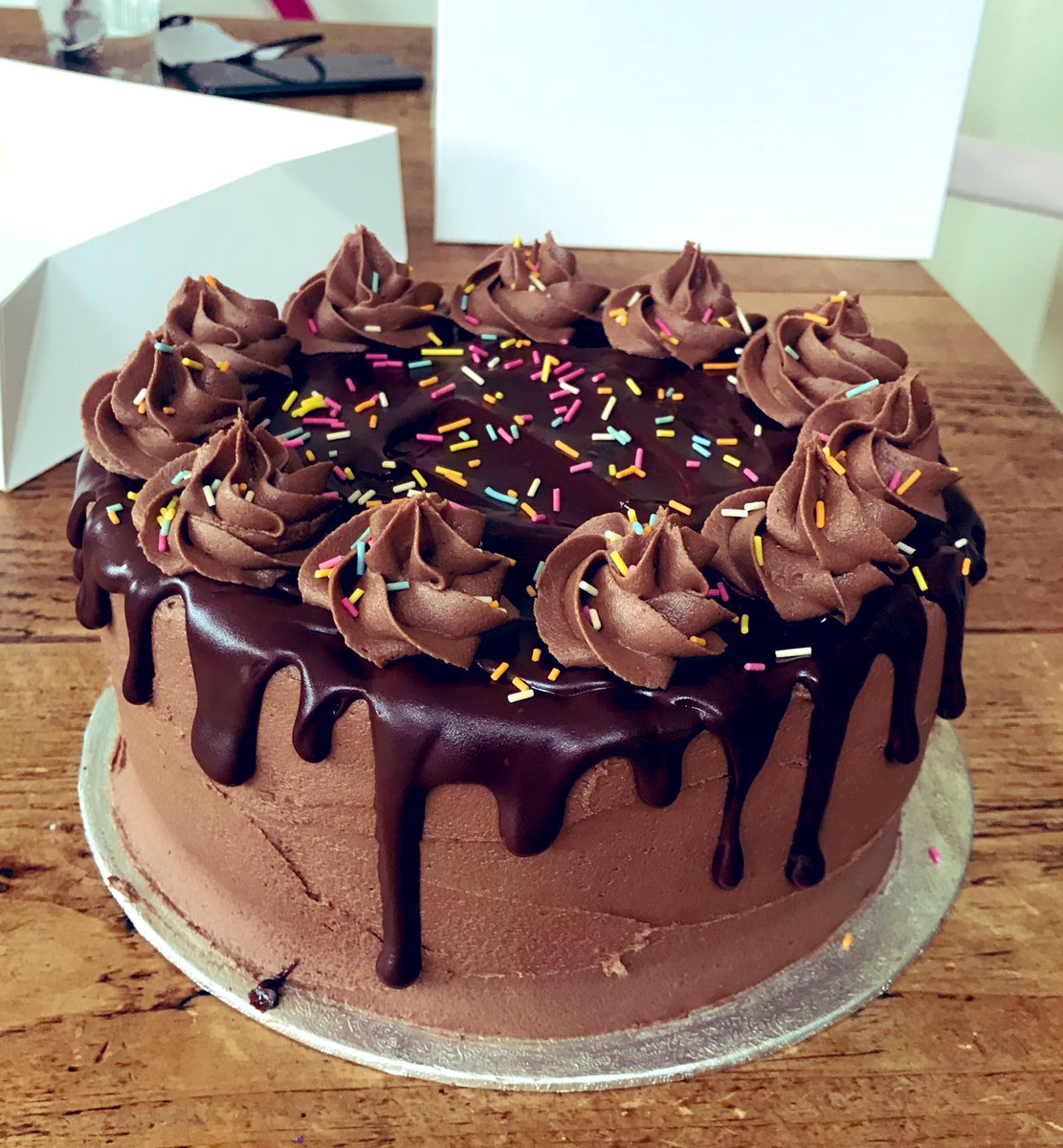 KristyShaw's tweet image. Whipped up two of these babies today for two different birthdays. 6 chocolate layers baked before 830am. Iced during lunch. #bakingmachine 😋 🎂