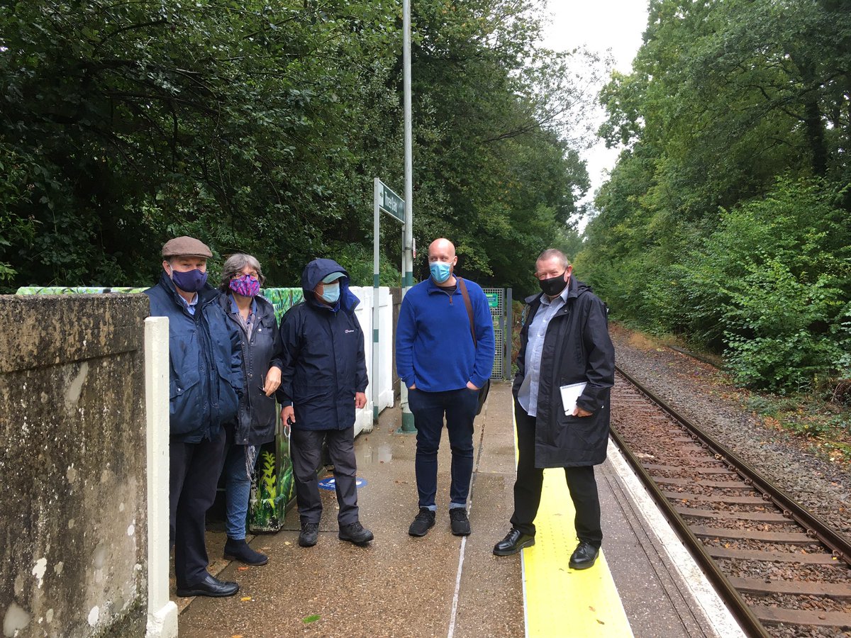 SoutheastCRP's tweet photo. A rather wet but enjoyable day out with new Marshlink community rail officer Harry and line director Kevin meeting station partners at Three Oaks and Winchelsea @SouthernRailUK @CommunityRail #Marshlink https://t.co/G08z79RfJq