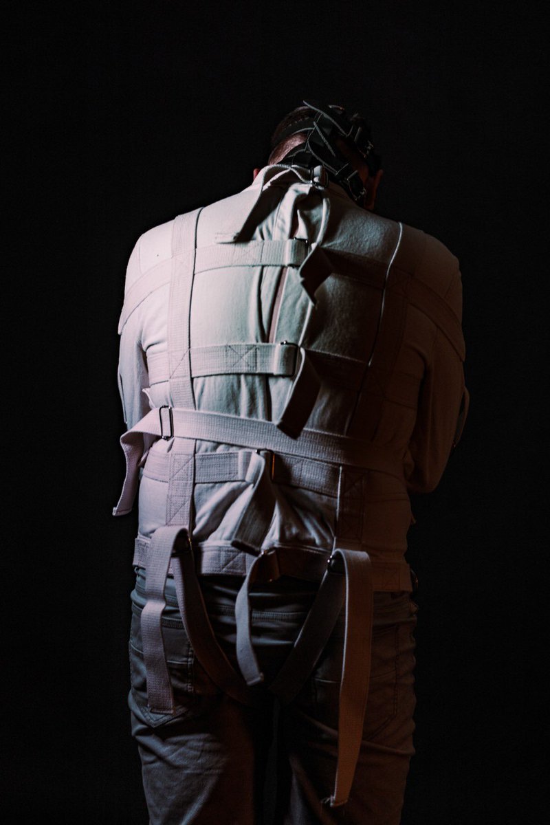 KinksterNL muzzled and in a straightjacket