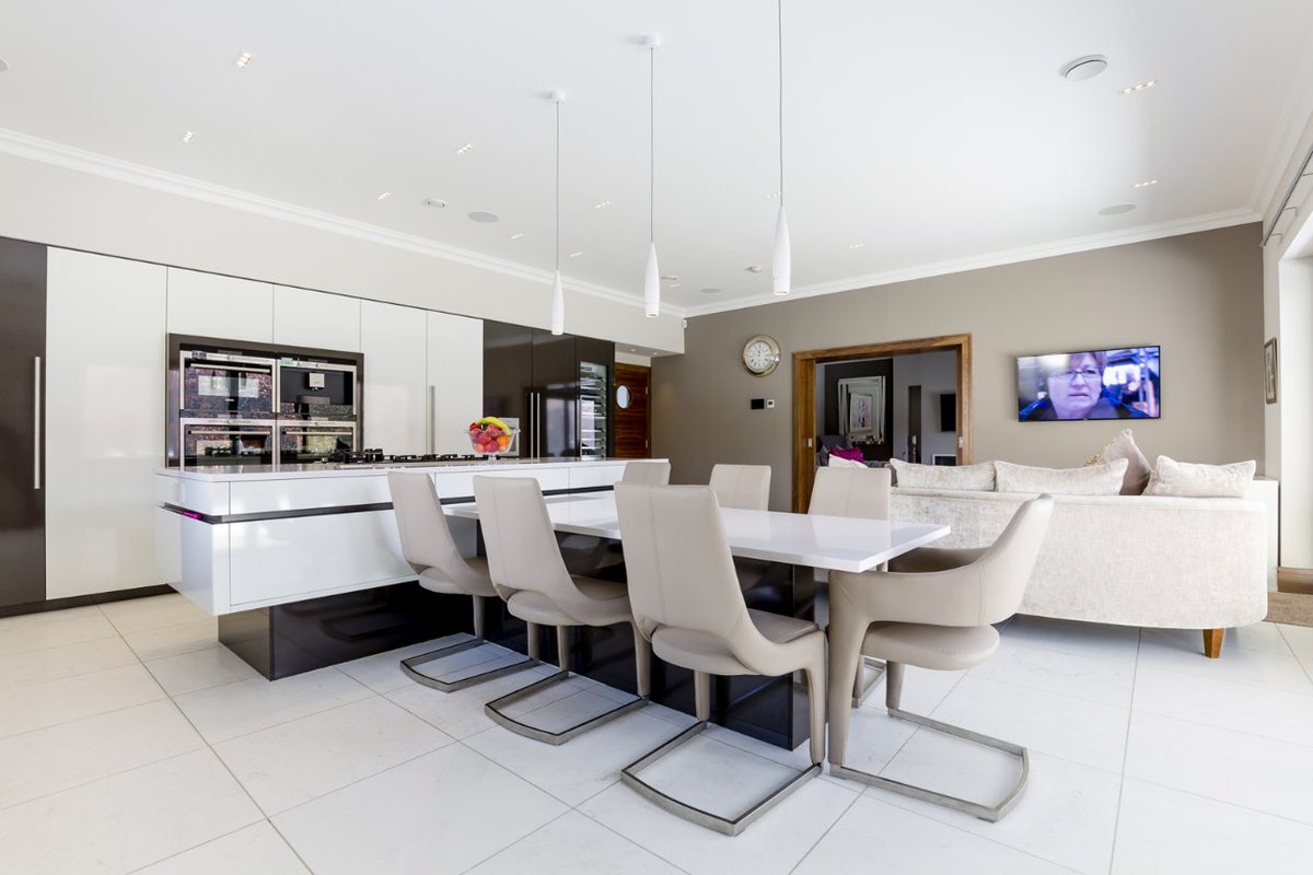 kitchensint's tweet photo. Are you an open plan living type of person? Then you'll love this new build kitchen/diner/living room. Its spacious design, hidden pantry (can you find it?) and the clean, linear lines are spectacular. #openplanliving #openplandesign #kitchen https://t.co/ODbVx4rJYO