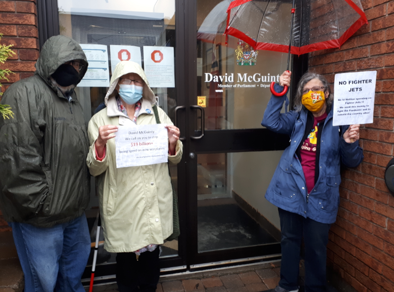 CBrentPatterson's tweet photo. The rain didn't dampen our resolve this morning to call on Ottawa-South Member of Parliament @DavidMcGuinty to speak out against the plan by @CanadianPM @JustinTrudeau's government to spend more than $19 billion on new fighter jets! #NoNewFighterJets #DefundWarplanes https://t.co/oD3oKSHgZ4