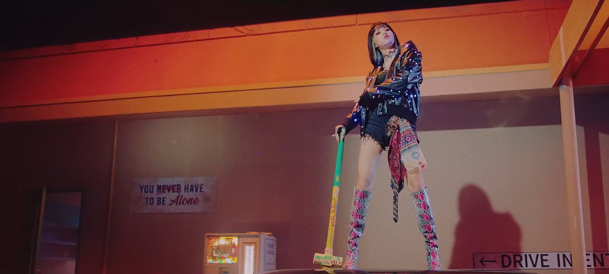 "FOR YOU" was written on the hammer. She smashed the car with it that may represent her past love, just like on jennie's scene.