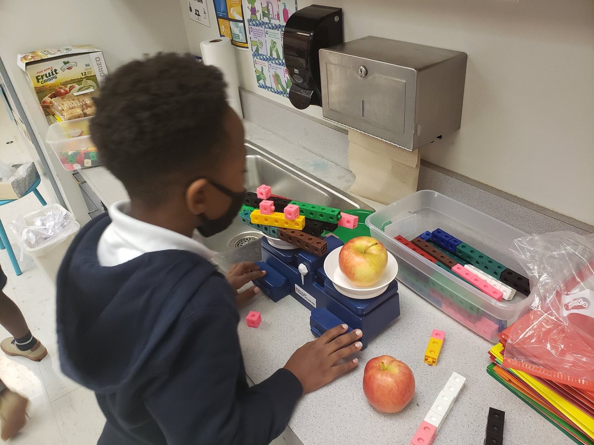 Mrs. Garcia at Ippolito measuring mass.  <a href="/IppolitoHCPS/">Ippolito Elementary</a> <a href="/HCPSElemScience/">HCPSElemScience</a>