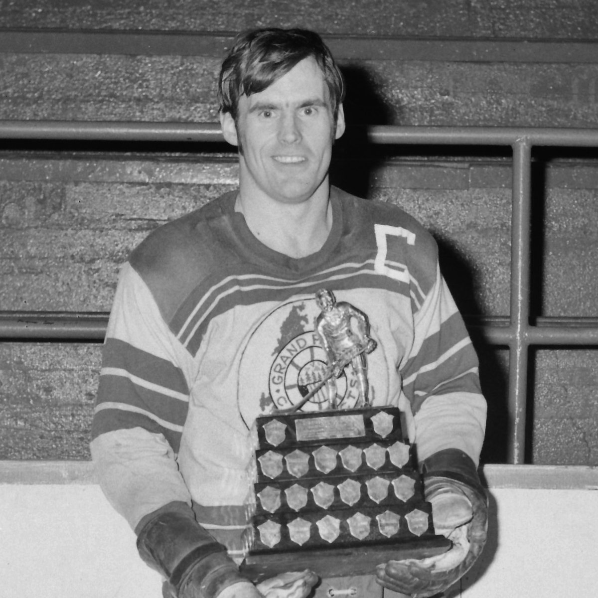Leo Murphy, Captain of the Grand Falls Cataracts, holding the iconic Herder in 1971. (source: GFWHS)